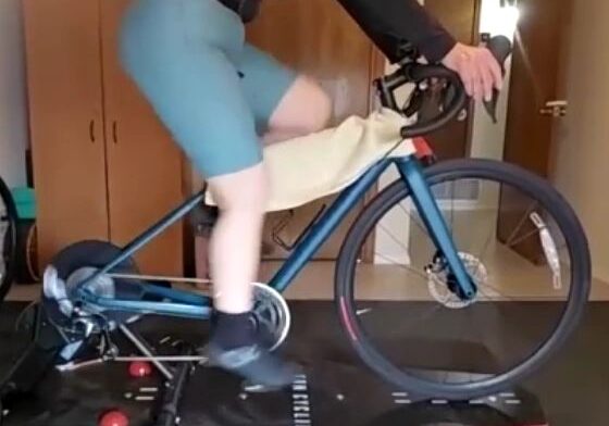 Person cycling on indoor trainer