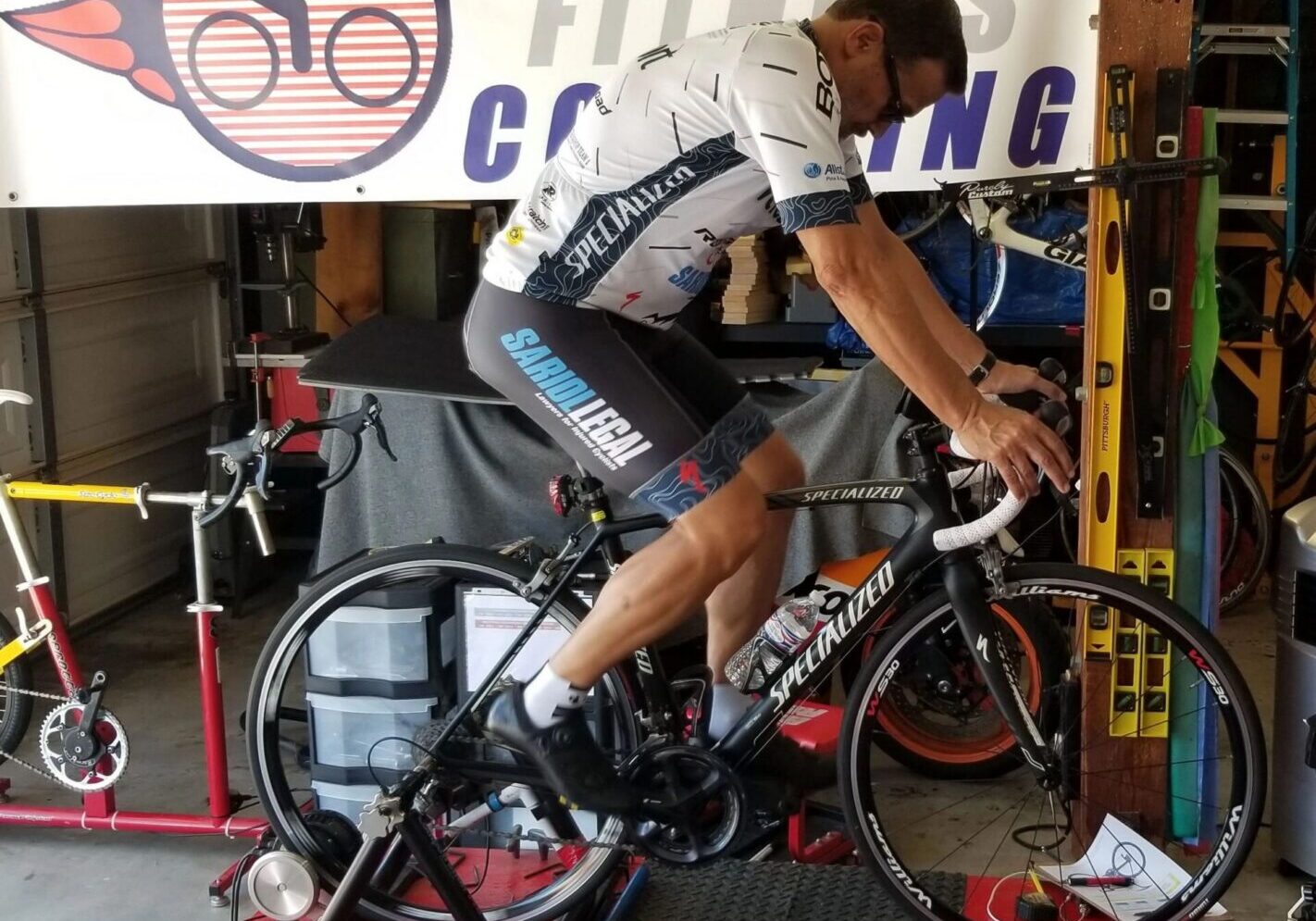 Indoor cycling workout with specialized gear.