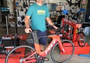 Bicycle mechanic in a garage setting