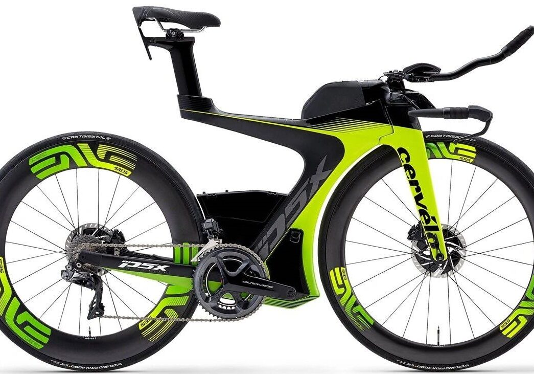 Aero triathlon bike with vibrant green accents.